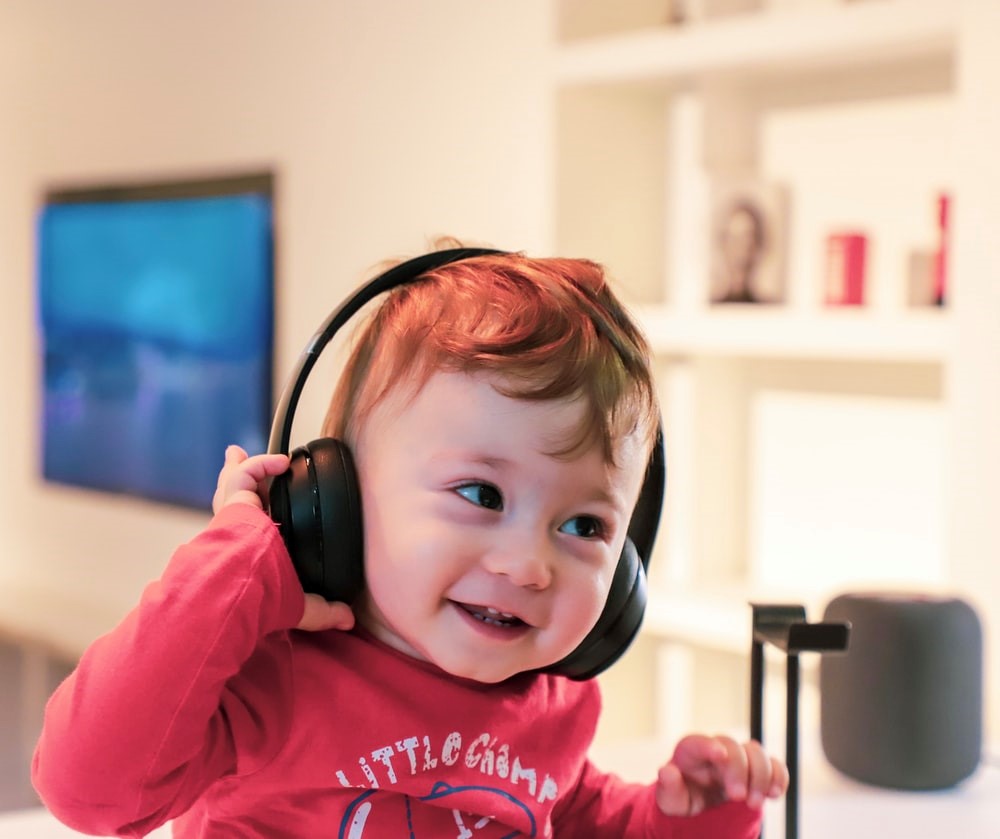 Baby listening with headphones